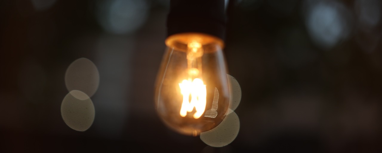An image of A close up of a lightbulb with gorgeous bokeh balls surrounding it.